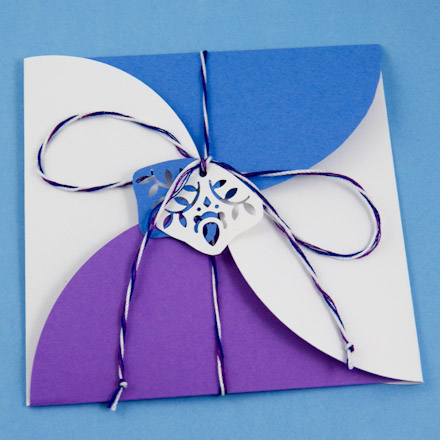 Square petal envelope tied close with string
