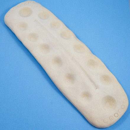 Unpainted dough clay mancala game board