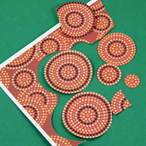 Cut circles from decorative paper