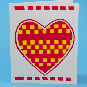 Woven paper strips heart