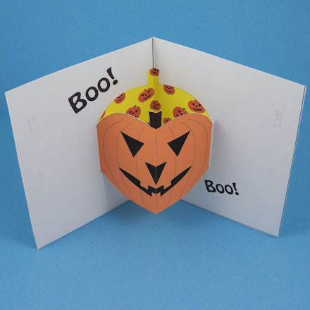 Jack-o'-lantern pop-up backed with decorative paper